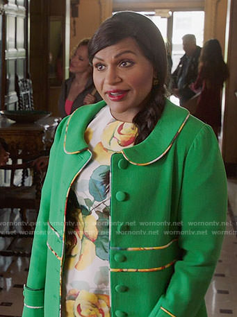 Mindy’s yellow rose print dress and green coat on The Mindy Project