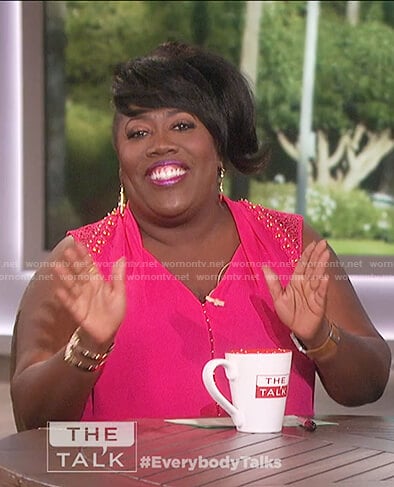 Sheryl’s pink embellished sleeveless top on The Talk