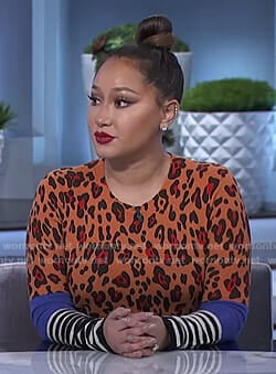 Adrienne’s orange leopard sweater on The Real