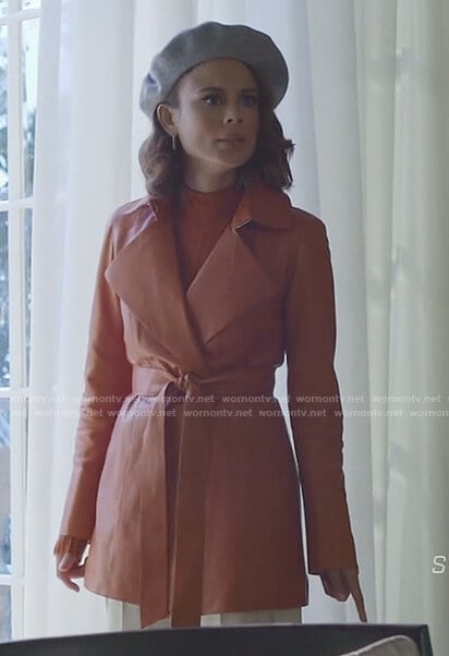 Cristal’s orange ribbed sweater and leather coat on Dynasty