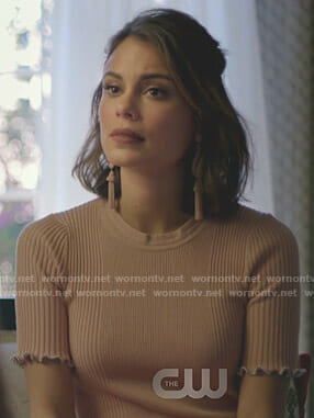 Cristal’s pink ribbed short sleeve top on Dynasty