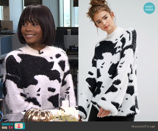E.L.K. High Neck Jumper In Cow Print Fluffy Knit worn by Zuri Hall on E! News