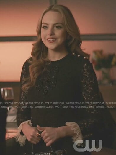 Fallon’s black lace dress with ruffle cuffs on Dynasty