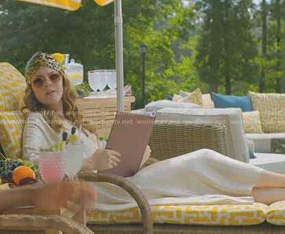 Fallon’s gold v-neck caftan on Dynasty