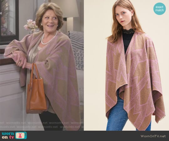 Maje Poncho with M Print worn by Judy Roberts (Linda Lavin) on 9JKL