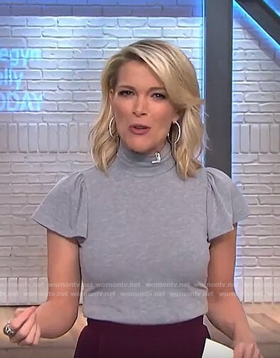 Megyn’s grey ruffle sleeve top and purple skirt on Megyn Kelly Today
