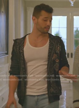 Sam’s navy medal print hoodie on Dynasty