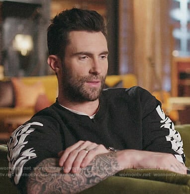 Adam Levine’s black sweatshirt with printed sleeves on The Voice