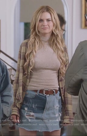 Karolina’s metallic high neck top and patch denim mini skirt  on Marvel’s Runaways
