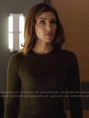 Dinah’s dark green sweater on Arrow