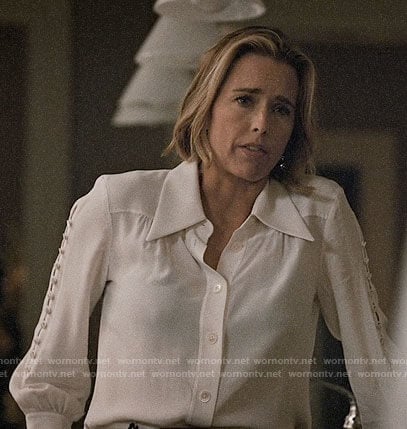 Elizabeth’s white buttoned sleeve blouse on Madam Secretary