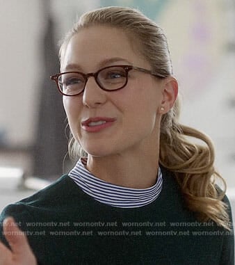Kara’s green dress with striped mock neck on Supergirl