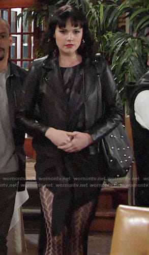 Tessa’s black feather print dress on The Young and the Restless