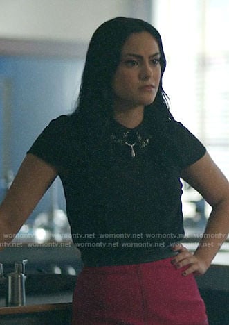 Veronica’s black top with embellished collar and pink skirt on Riverdale