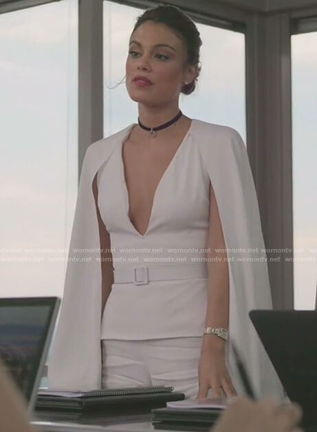 Cristal’s white v-neck caped jumpsuit on Dynasty