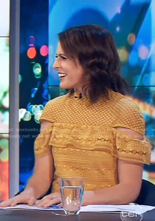 Rachel’s yellow lace ruffle front dress on The Project