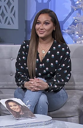 Adrienne’s black printed wrap top on The Real