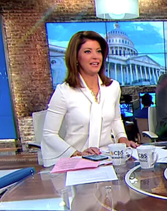 Norah’s white bell sleeve tie neck dress on CBS This Morning