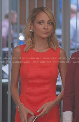Portia’s orange ribbed sheath dress on Great News
