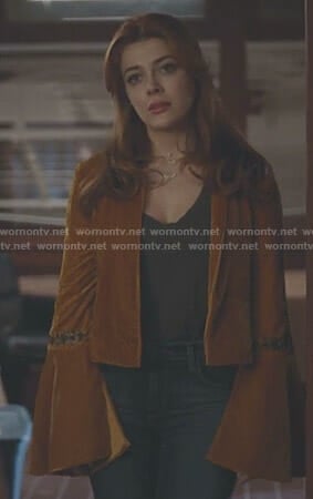 Sonia’s orange velvet bell sleeve jacket on The Gifted