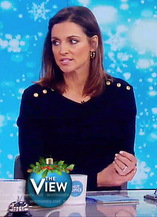 Paula’s black button embellished sweater on The View