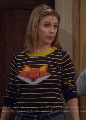 Kimmy’s striped fox sweater, embroidered jeans and cat flats on Fuller House