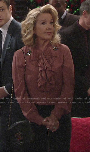 Nikki’s pink ruffled blouse with embellishments on The Young and the Restless
