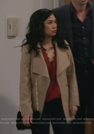 Eve’s red lace trim wrap top and beige coat on 9JKL