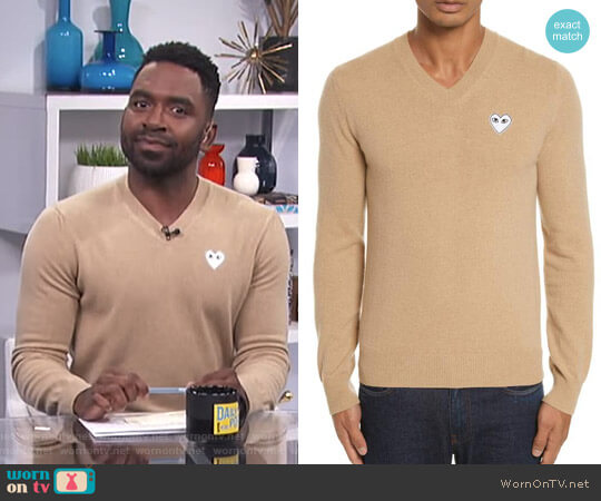 Comme Des Garçons Play PLAY White Heart Wool V-Neck Sweater worn by Justin Sylvester on E! News