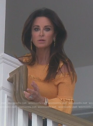 Kyle’s yellow smocked cold-shoulder top on The Real Housewives of Beverly Hills