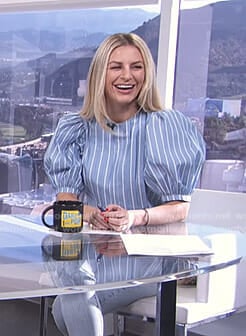 Morgan’s blue striped balloon sleeve top on E! News Daily Pop