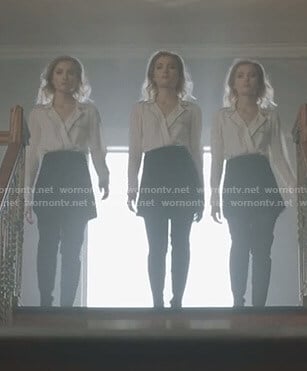The Stepford Cuckoos’ white wrap blouse with black piping on The Gifted