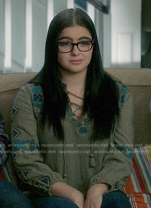 Alex’s embroidered lace-up top on Modern Family