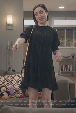 Jen’s black polka dot mini dress on Life in Pieces