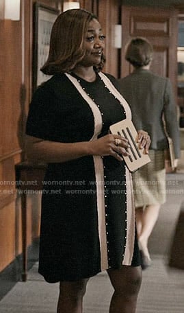 Daisy’s black dress with front stripes on Madam Secretary
