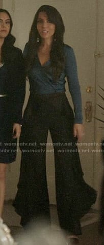 Hermione’s blue wrap top and side ruffle pants on Riverdale