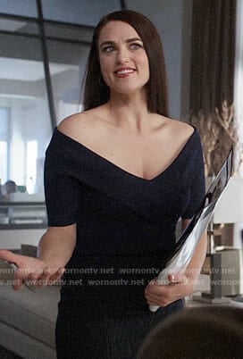 Lena’s navy off-shoulder top on Supergirl
