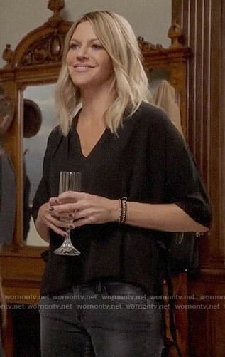 Mickey’s black v-neck top with side ties on The Mick