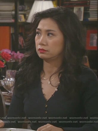Eve’s blue gold button sweater on 9JKL