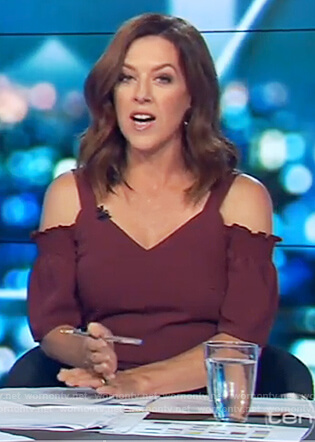 Gorgi’s red cold shoulder jumpsuit on The Project