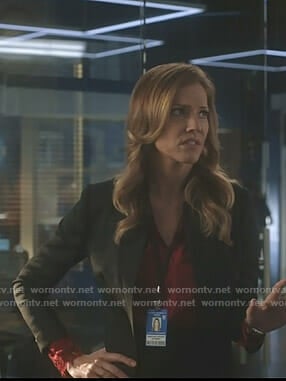 Charlotte’s red blouse with cutout cuffs on Lucifer