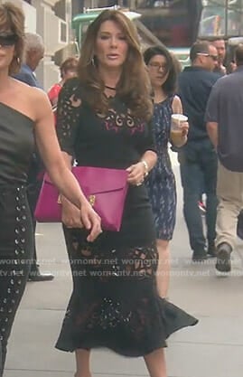 Lisa’s black laser cut midi dress on The Real Housewives of Beverly Hills