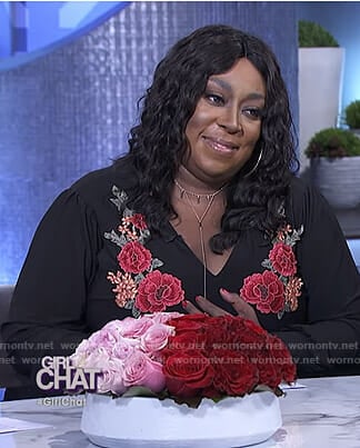 Loni’s black floral embroidered jumpsuit on The Real