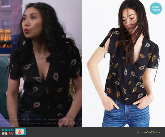 Madewell Silk Belle Top in Peacock Feathers worn by Eve Roberts (Liza Lapira) on 9JKL