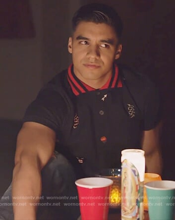 Vivek’s black embroidered polo on Grown-ish