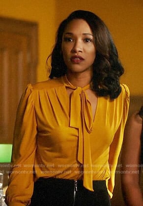 Iris’s yellow tie neck blouse on The Flash
