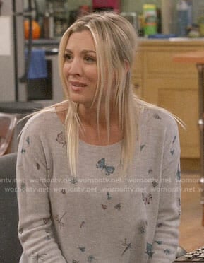 Penny’s butterfly print sweater on The Big Bang Theory
