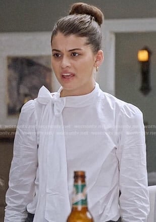 Sabrina’s white poplin bow neck top on The Mick