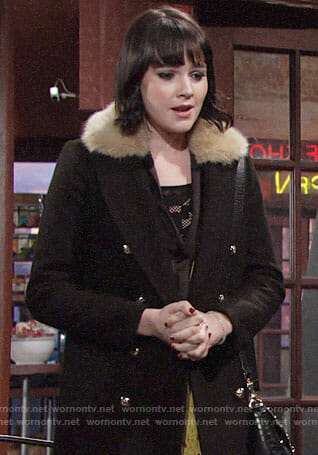Tessa’s black coat and plaid side-stripe pants on The Young and the Restless