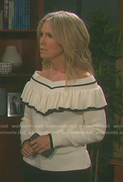 Jennifer’s white off-shoulder ruffled sweater on Days of our Lives